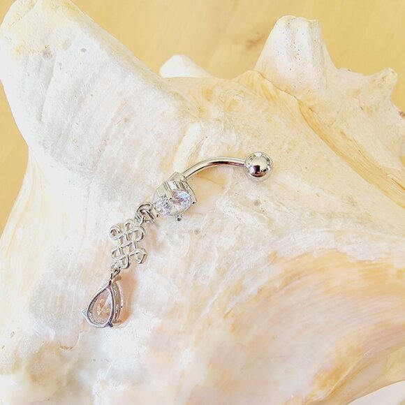 14G dangle belly button ring with decorative celtic shape charm in clear CZ - Picture 2 of 5